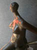 Female, black, seated, piece no. 1. Partial