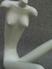 Female, white, sitting, piece no. 1. Partial.